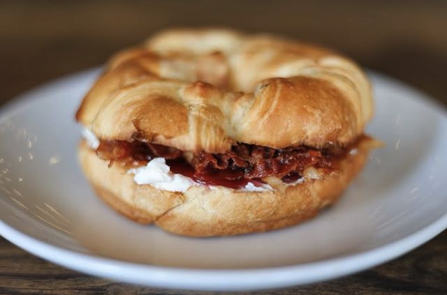A bagel sandwich with bacon and cream cheese